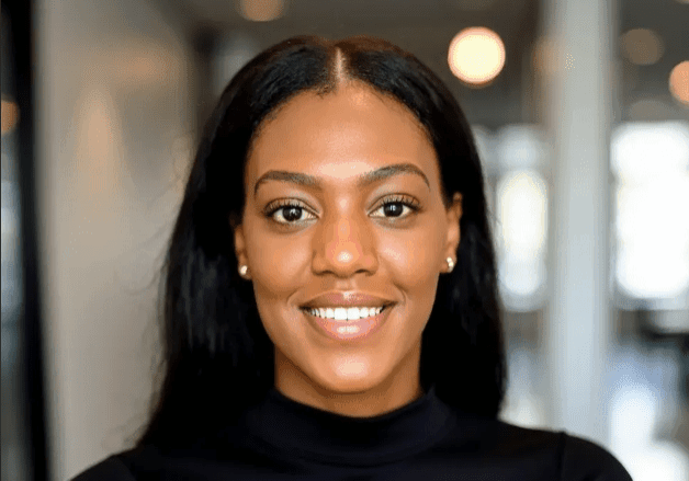 Smiling woman in a professional setting.